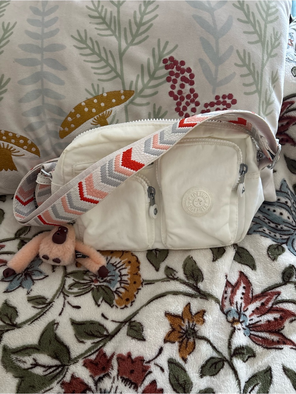 Kipling White Crossbody Bag with Red & Gray Chevron Strap